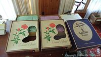 Lot of 3 vintage blankets in original boxes including two Esmond with rose designs on box and one Haddon Hall with blue box