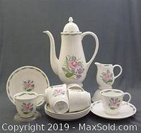 Full view of coffee set including pot, cups, saucers, creamer, sugar bowl, arranged to show pattern and condition.