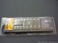 Top view photo of the set in clear plastic packaging showing the 8 deep well sockets arranged side by side with size marking.