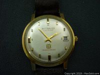 Front view of the vintage Wittnauer Electronic Transistorized wristwatch showing the dial details, case, and strap.