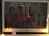 Framed signed print by Adrian Wong Shute with abstract design, showing colors and signature below.