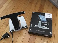 Photo showing Mophie Powerstand adjustable stand along with charger cable and original packaging box.