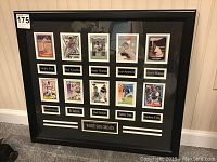 Full view of framed collection of 10 Chicago White Sox baseball cards, mounted on black matting with title 'White Sox Greats' plaque at bottom center.