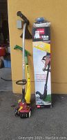 View of the three tools, Toro trimmer and edger, Homelife gas wacker, and Electra Lite electric wacker with Toro manual.