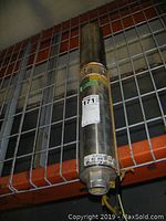 Full view of the Monarch well pump showing the general cylindrical shape and measurement.