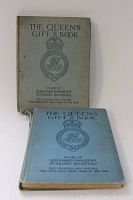 Front covers of the two Queen's Gift Books showing titles, publisher, and royal emblem in blue ink on light blue/gray hardcovers.