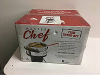 Box front view showing brand Master Chef and indication that this is a fish fryer kit for outdoor use with 6 pieces.