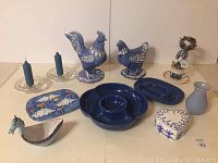 Photo showing full lot with all blue-themed decorative items arranged on table