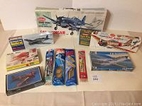 Photo showing the entire collection of model airplane kits and wooden gliders with their boxes and packaging