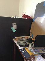 Partial view of storage unit corner and surrounding area.