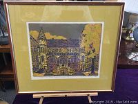 Framed woodcut print showing the architectural scene of Ontario Hall at Queens University Kingston on an easel.