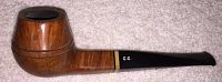 Side view of a wooden tobacco pipe with cylindrical bowl and G.G. engraved on black stem