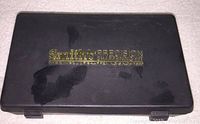 Closed black plastic case with gold logo reading 'Smiths Precision Sharpening Kit'