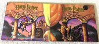 Front and back of the Harry Potter and the Sorcerer's Stone DVD foldout sleeve showing illustrated artwork and the title.