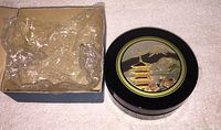 Original box with plastic wrap lining showing the storage condition of coasters