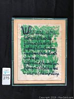 Front view of framed silk screen broadside with green bamboo style frame and visible age wear.