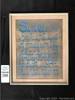 Photo of framed silk screen broadside print with blue handwritten style text by Kenneth Patchen from the Glory Never Guesses series.