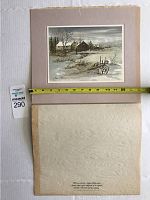Top view of signed lithograph mounted on tan mat board with measuring tape showing approximate width of 13 inches.
