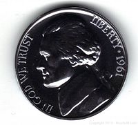 Obverse side showing profile of Thomas Jefferson with inscriptions and year 1961.