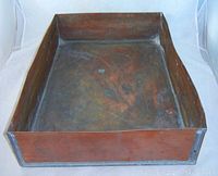 Top-down view showing interior surface with patina and oxidation marks.