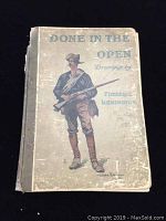 Front cover of the book showing a man holding a rifle in period western clothing, with title and artist name visible.