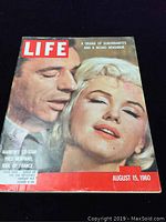 Front cover featuring Marilyn Monroe and Yves Montand with issue date and headline.