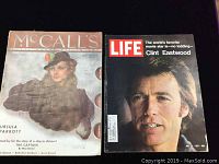 Photo showing front covers of Life July 1971 featuring Clint Eastwood and McCall's January 1935 magazines