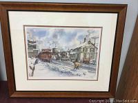 Overall framed print showing the winter train yard scene with snow and steam locomotives