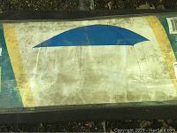 Escort gazebo black carry bag with printed label showing a blue dome roof illustration.