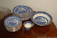 Overall arrangement of plates, bowl, and cup on table