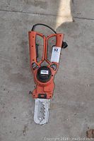 Top view of Black and Decker Alligator garden lopper model LP1000 CA showing handles, label, and cutting blades.