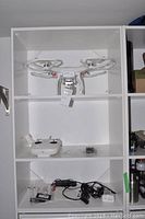 Front view of drone mounted in shelf