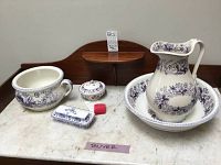 All seven pieces arranged on marble top