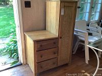 Full side-by-side furniture unit showing dresser and wardrobe with visible wear and wood grain.