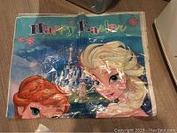 Frozen Happy Easter banner featuring Anna and Elsa characters on a plastic sheet, suitable for hanging as party decoration