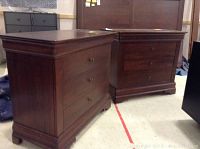 Two matching dressers side by side