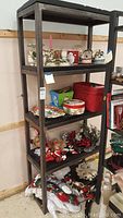 Front view of shelf unit holding various items to show size and structure.