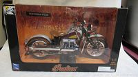 Front view of unopened New Ray 1938 Indian Four die-cast model in original display box featuring vintage artwork.