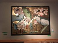 Front view of the 4-panel hinged artwork featuring birds and lotus flowers