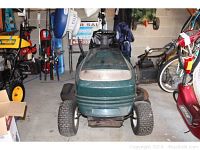 Front view of green hood and grille
