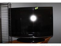 Front view of Samsung 26 inch TV showing screen and bezel.