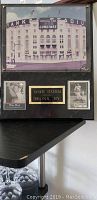 Framed collage showing photo of Yankee Stadium with the two baseball cards and plaque.