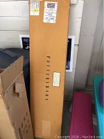 Photo of the unopened box with Pottery Barn branding visible.
