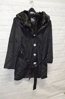 Front view of the black faux shearling coat with buttons, faux fur collar, and belt.