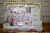 Photo of the complete Kimberley quilt set packaging with quilt and pillow images shown on the label, indicating the pattern and contents.