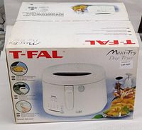 Front view of the T-FAL Maxi-Fry deep fryer box showing the product image and features.