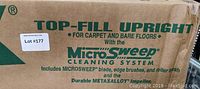 Close-up photo of the box with MicroSweep cleaning system branding and product features on a cardboard box.