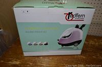 Front of the box showing Redfern branding and product image of the GS20-AJ garment steamer.