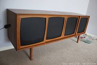 Full front view of entire teak sideboard