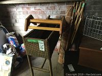 Planter, baby gate, bamboo shade, wire basket, foot rest grouped together showing all items from a distance.